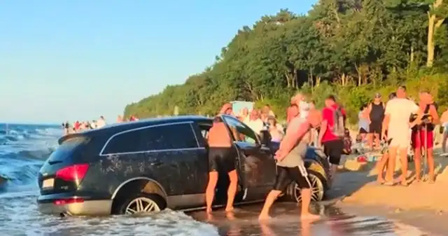 Bałtyk niemal pochłonął Audi Q7. Napęd quattro nie pomógł Niecodzienny, widok, zastał, turystów, wypoczywających, plaży, Gąskach, Właściciel, czarnego, Audi, bardzo, uwierzył, terenowe, Bałtyk niemal pochłonął Audi Q7. Napęd quattro nie pomógł